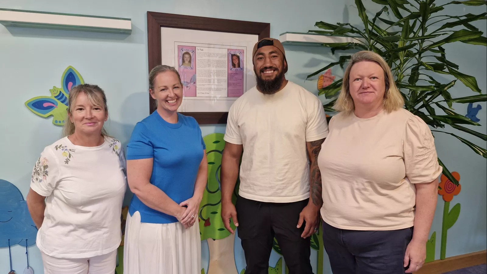 Bundee Aki with CEO Kerry McLaverty, Siobhan Reilly and Liz O'Donoghue