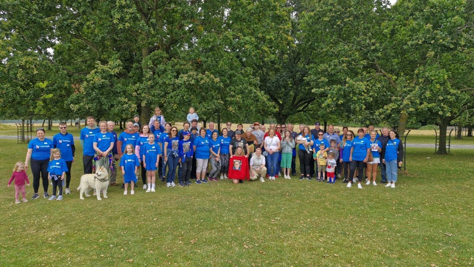 Group picture of families, staff and volunteers 